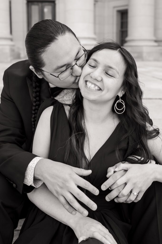 Autumn and Michael sharing a moment on the steps of the Wisconsin State Capitol