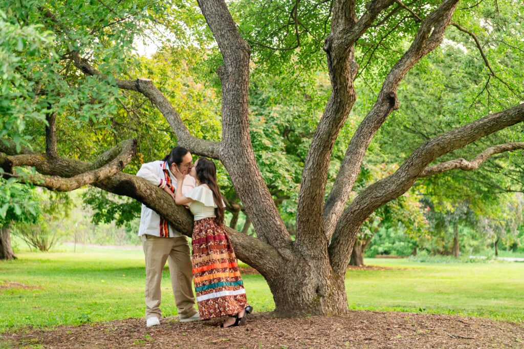 Couple walking through the UW Arboretum trails in matching ribbon outfit