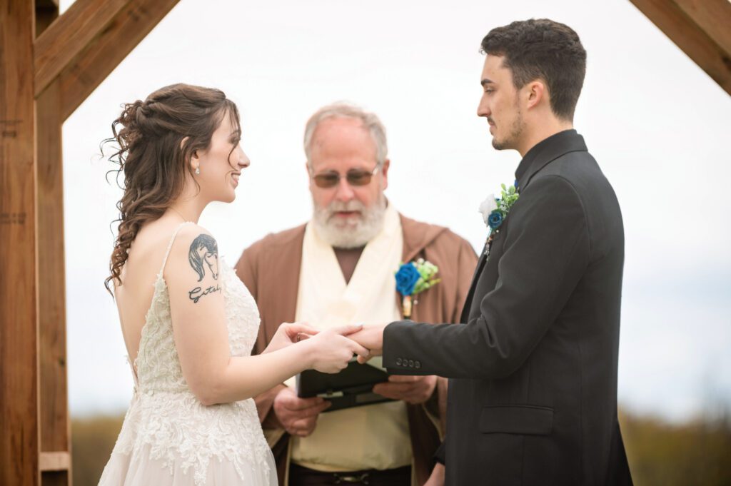 Rustic outdoor wedding ceremony at Deerfield Rod and Gun Club