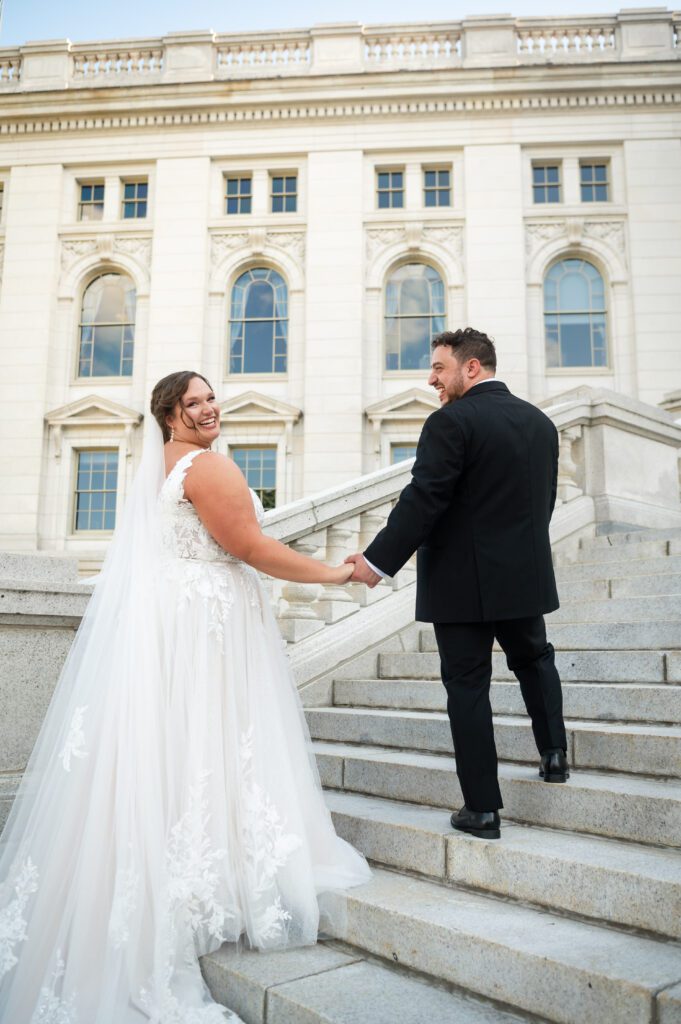 Couple sunset photo with Madison Capitol in background