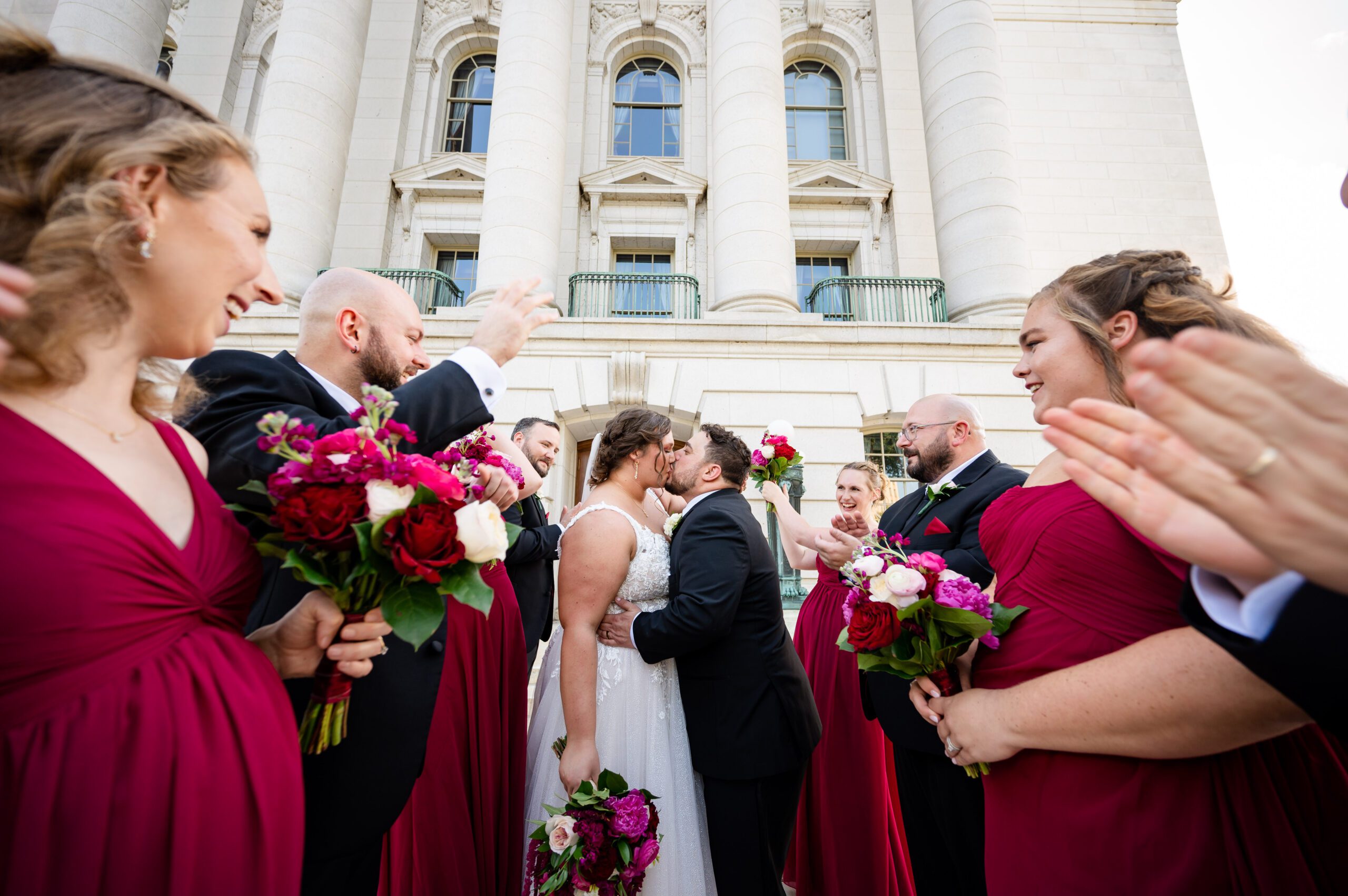 Bride and groom kiss on stage at Majestic Theatre Madison