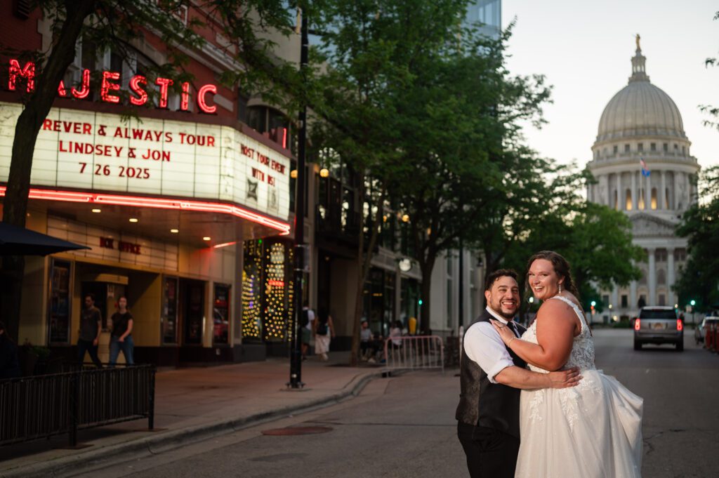 Wedding party photo outside Majestic Theatre marquee