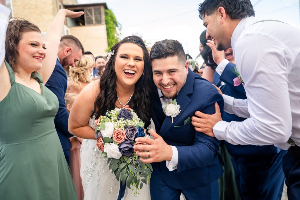 Close-up of the bride and groom sharing smiles after their wedding