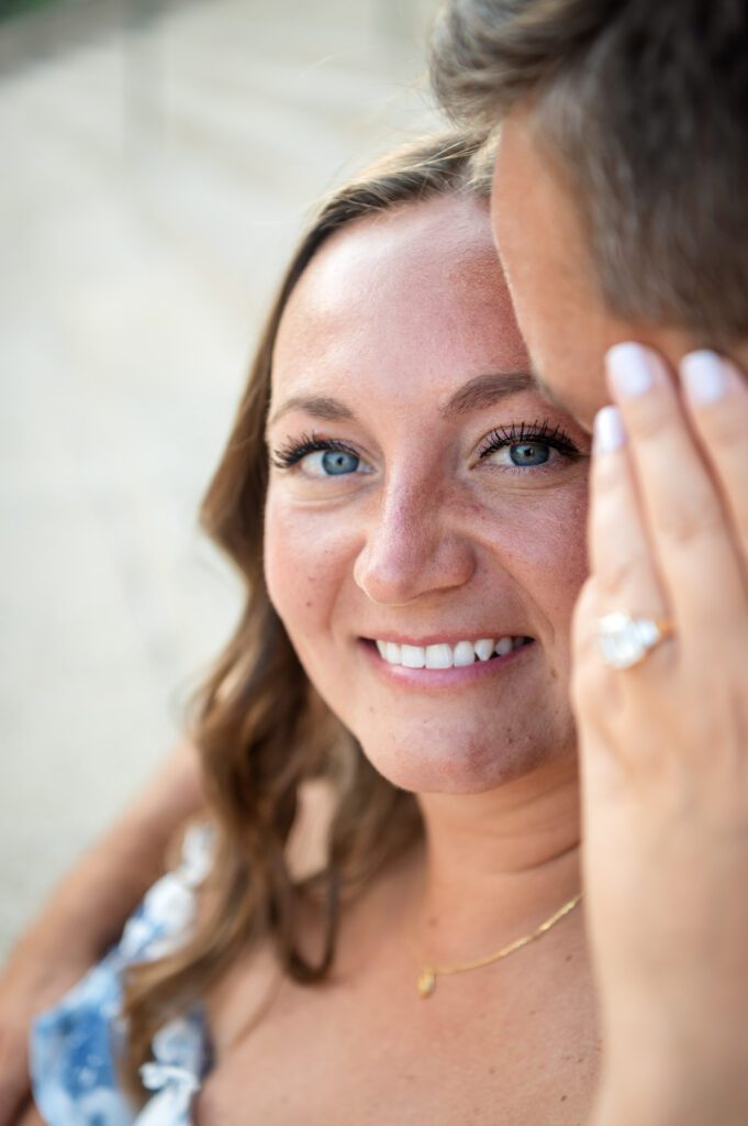 Bride-to-be showing off engagement ring from BR Diamond Suite in Madison WI.