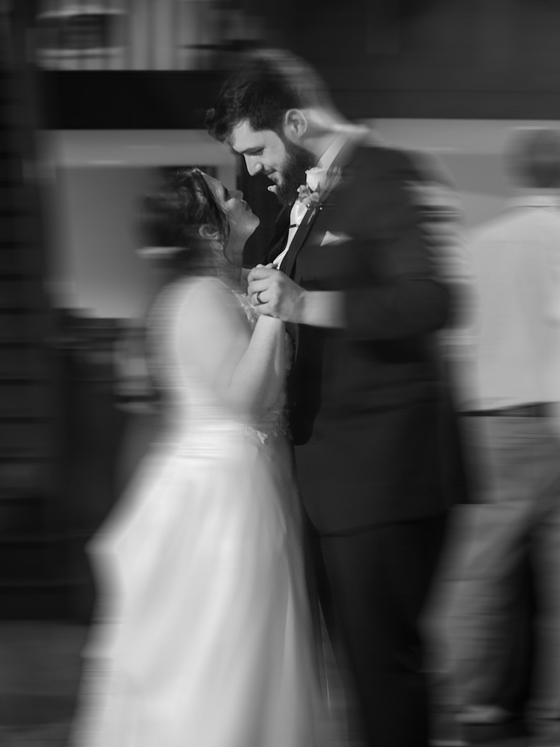 The bride and groom share a dance together (how to find your perfect wedding photographer)